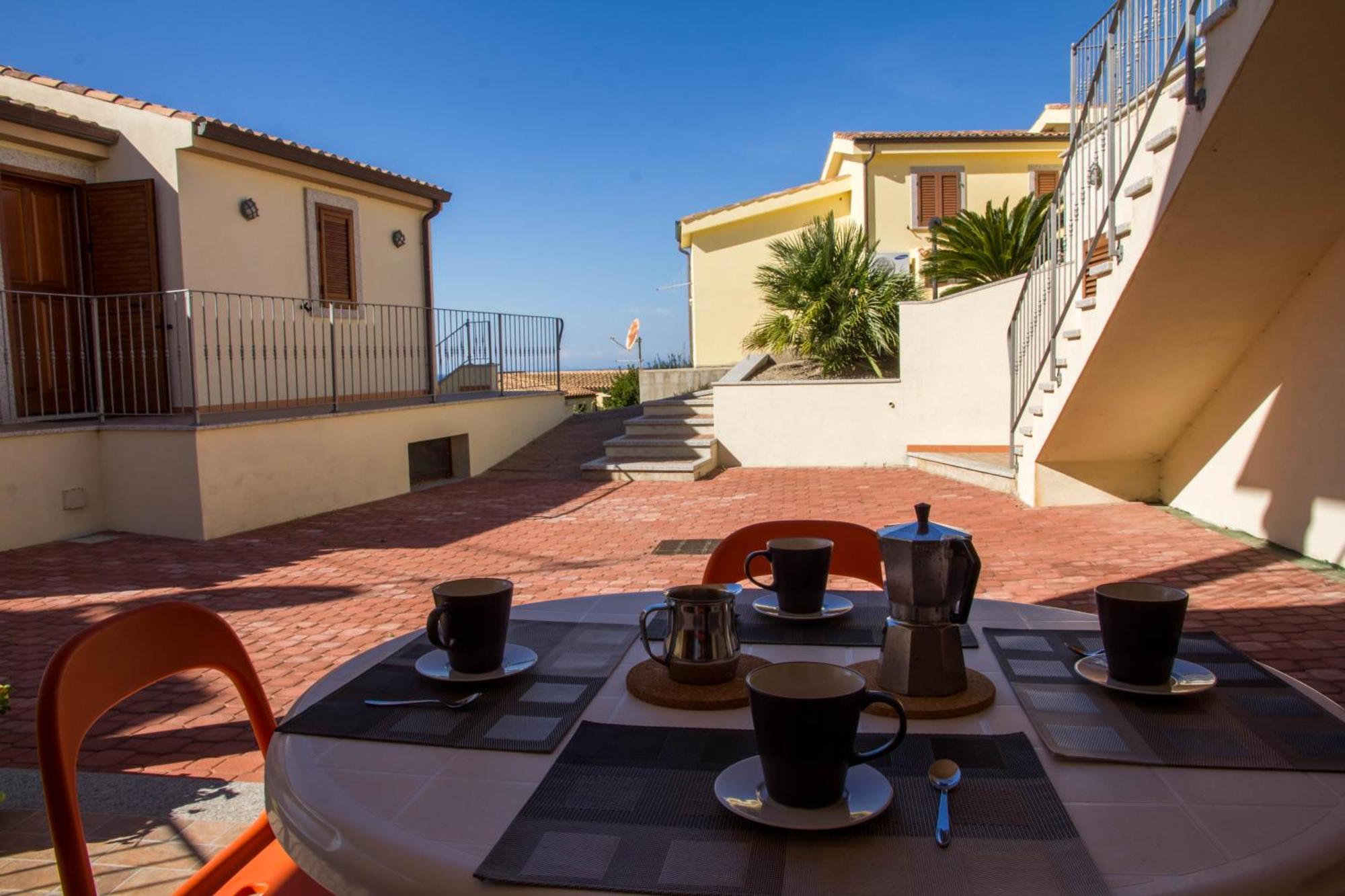 Gf Apartments Li Seddi Badesi Exterior photo