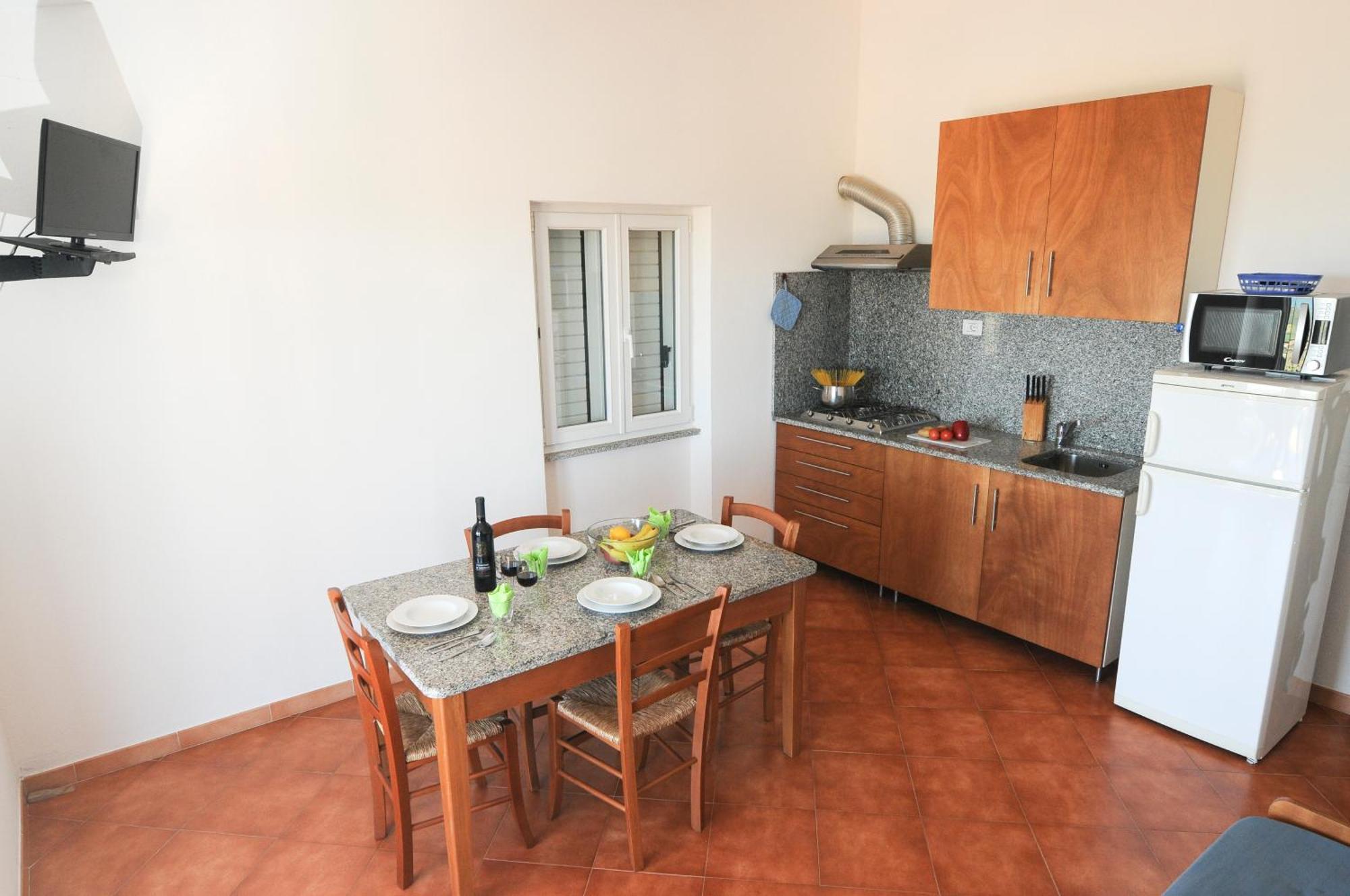 Gf Apartments Li Seddi Badesi Exterior photo