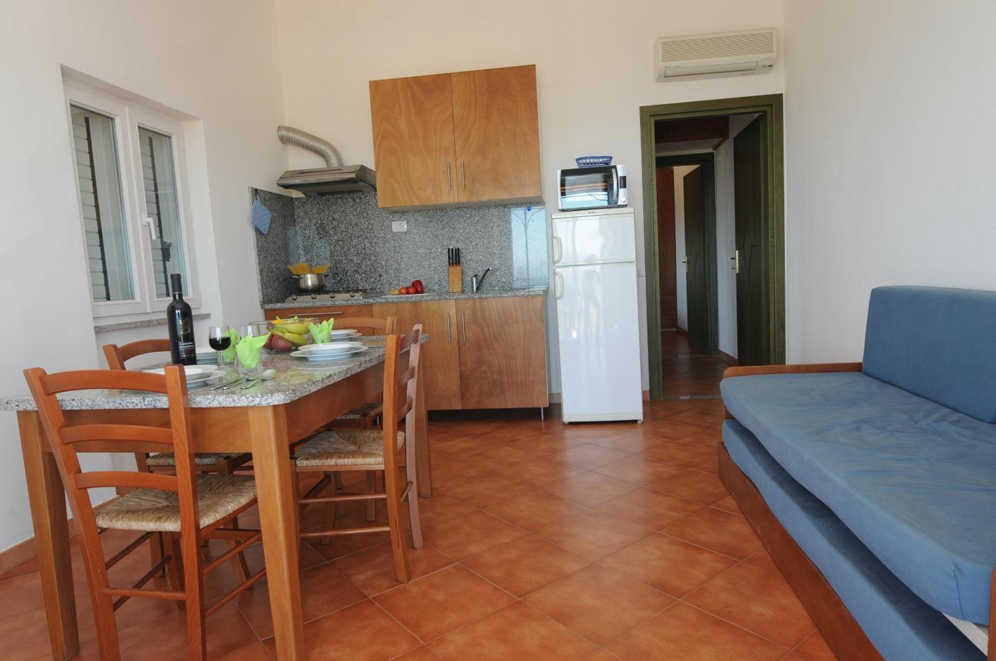 Gf Apartments Li Seddi Badesi Exterior photo