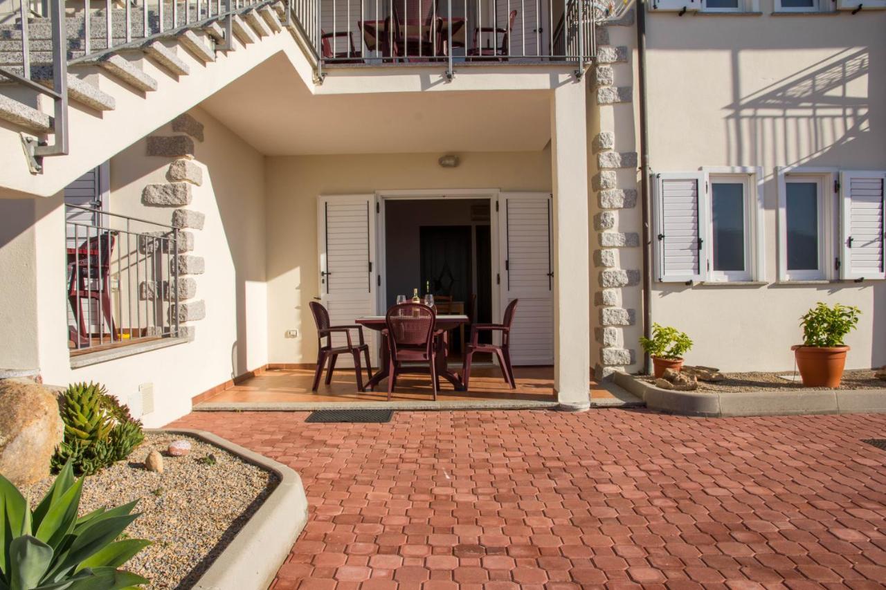Gf Apartments Li Seddi Badesi Exterior photo